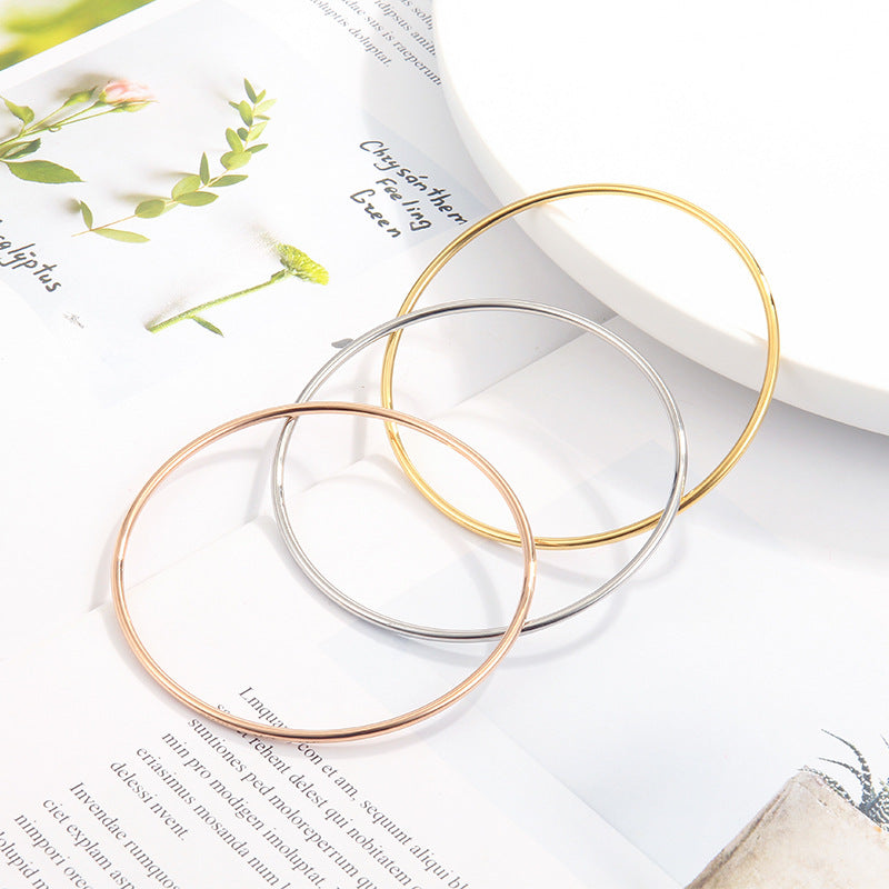 Women's Simple Gold Titanium Steel Coil Thin Bracelets