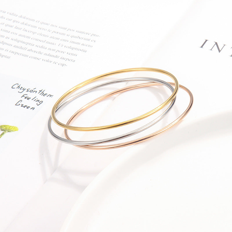 Women's Simple Gold Titanium Steel Coil Thin Rings