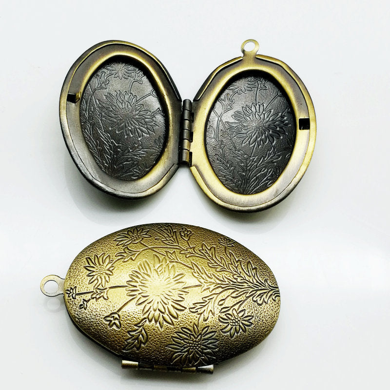 Oval Frame Carved Open Box Bronze Pendants