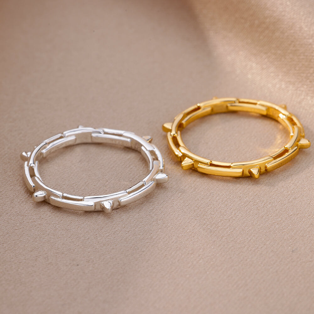 Women's & Men's Wind Simple Hollow Gold-plated Stainless Steel Rings