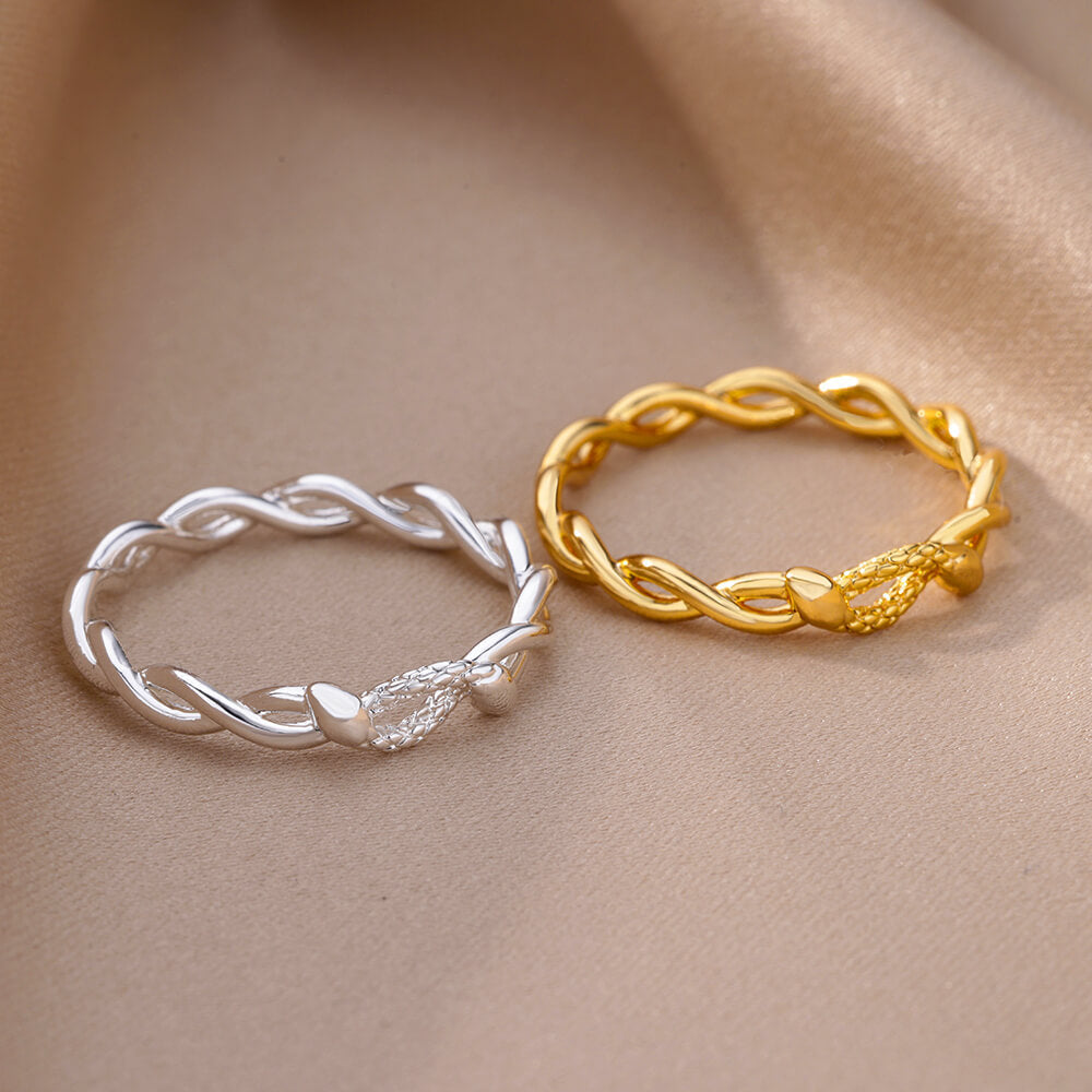 Women's & Men's Wind Simple Hollow Gold-plated Stainless Steel Rings