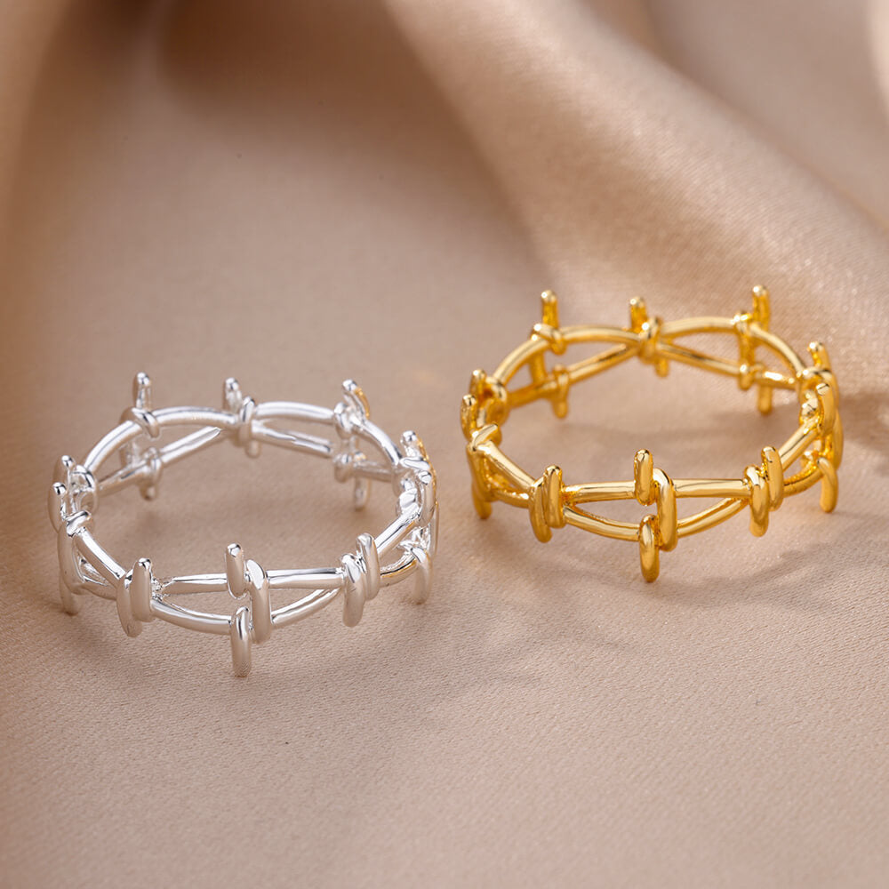 Women's & Men's Wind Simple Hollow Gold-plated Stainless Steel Rings