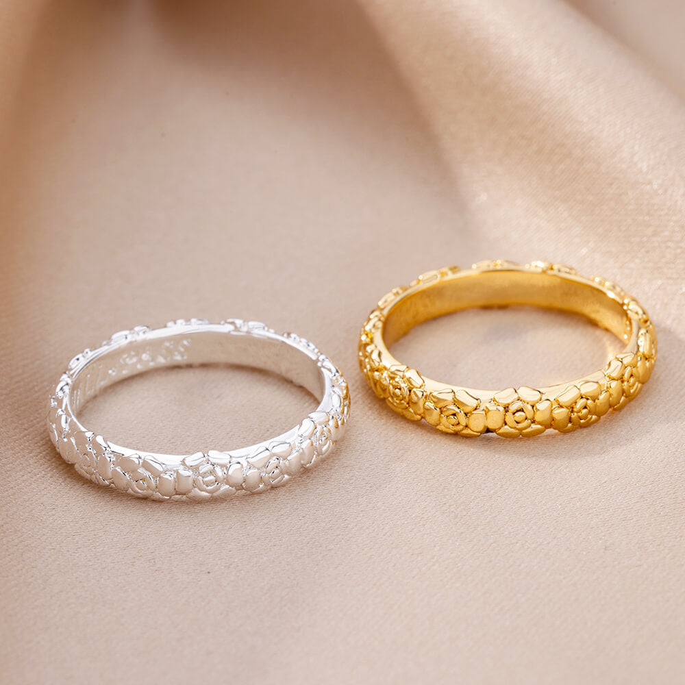Women's & Men's Wind Simple Hollow Gold-plated Stainless Steel Rings