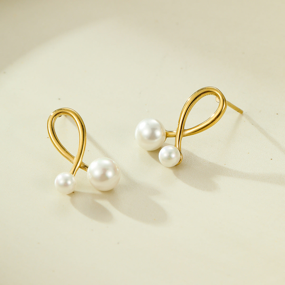 Exquisite Elegant Stainless Steel Knotted Pearl Earrings