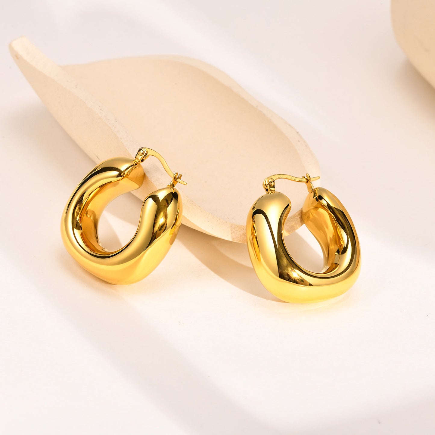 Women's Ornament Titanium Steel Hollow Chubby Exaggerated Earrings