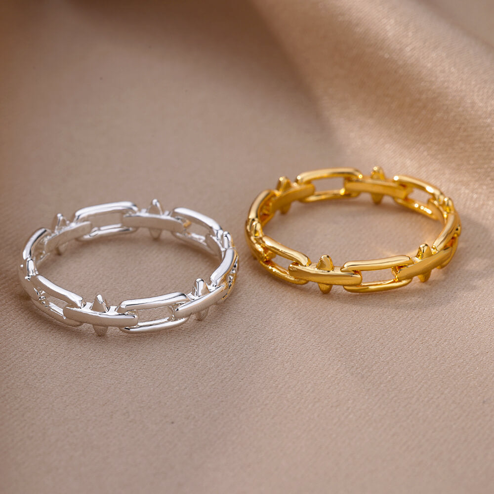 Women's & Men's Wind Simple Hollow Gold-plated Stainless Steel Rings