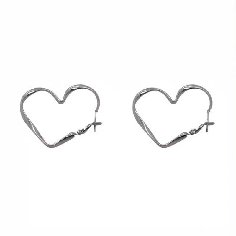 Women's Hollow Heart Ear Autumn Design Sweet Cool Hot Stud Earrings