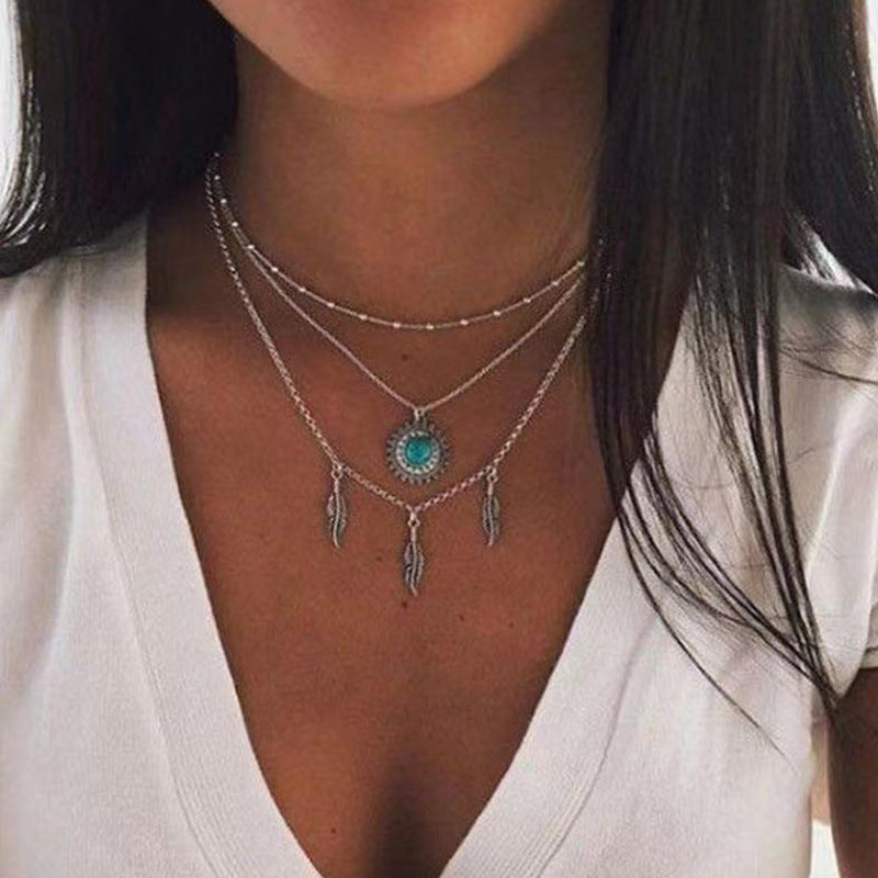 Retro Turquoise Spot Drill Alloy Feather Necklaces