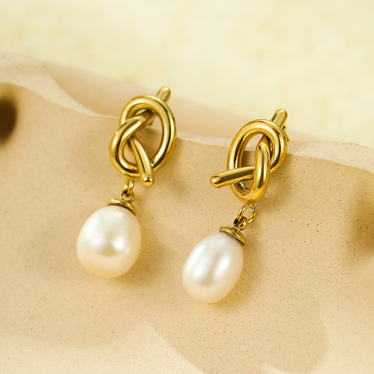 Exquisite Elegant Stainless Steel Knotted Pearl Earrings