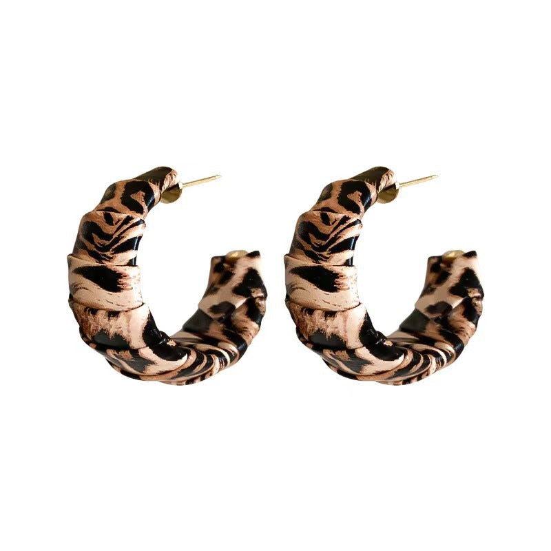 Women's Pattern Shaped Leather High Sense Light Earrings
