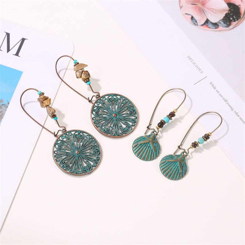 Women's Ancient Bronze Eye-catching Hollow Flower Leaf-shaped Rings