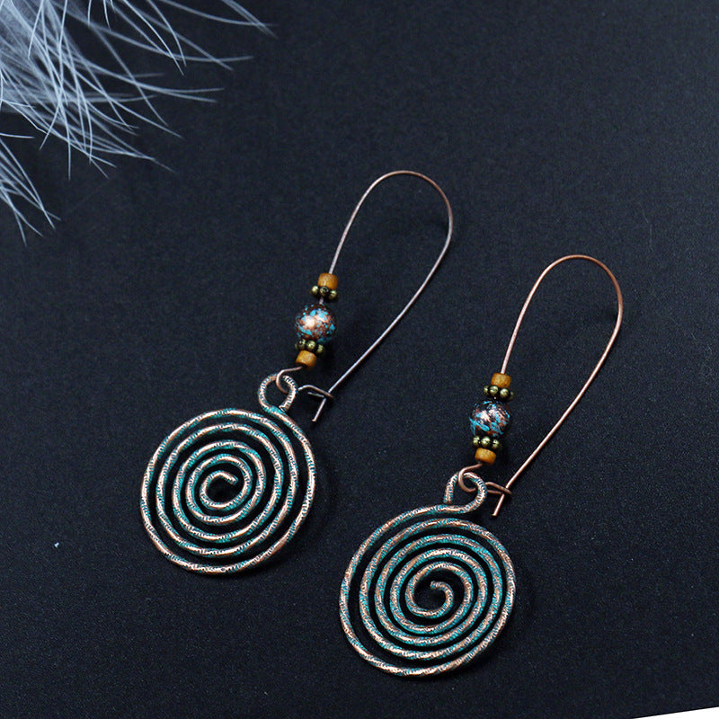 Ancient Bronze Metal Exaggerated Carved Female Earrings