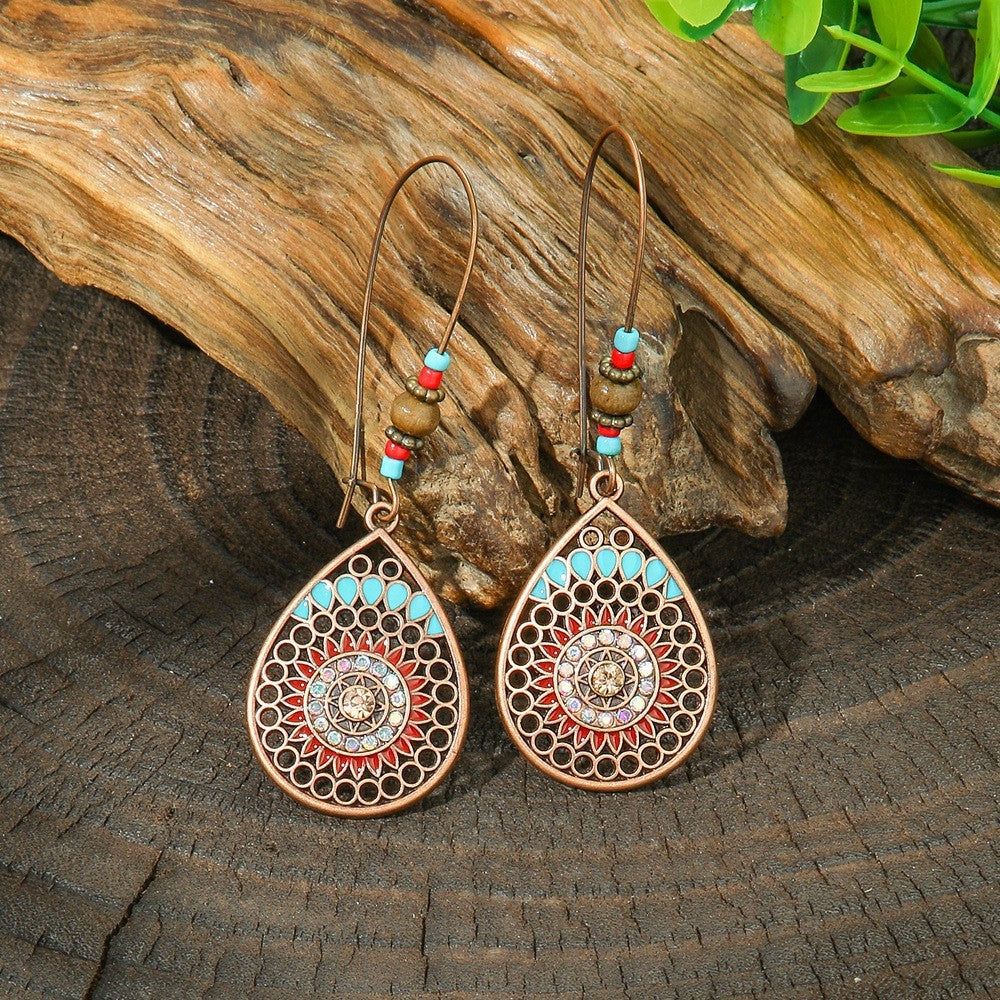 Ancient Bronze Metal Exaggerated Carved Female Earrings