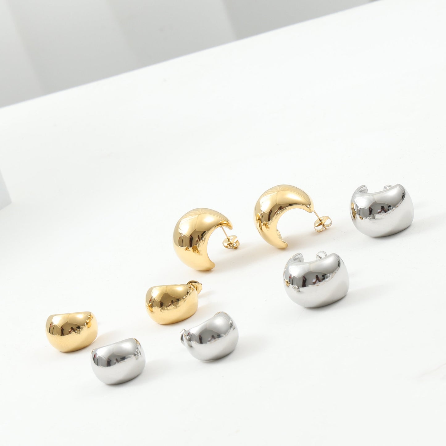Large Curved Ball Surface Titanium Steel Earrings