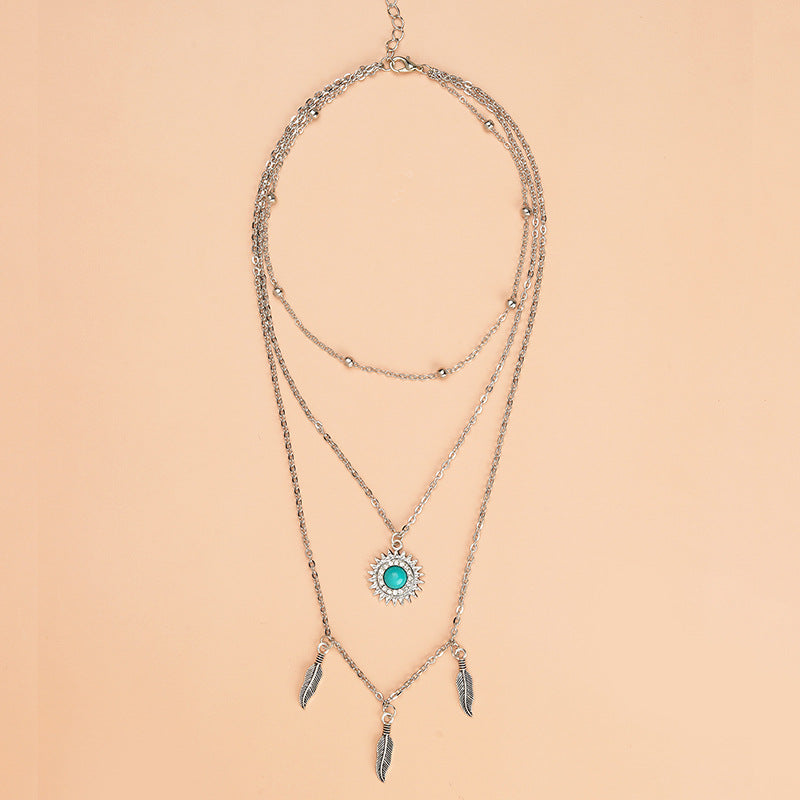 Retro Turquoise Spot Drill Alloy Feather Necklaces