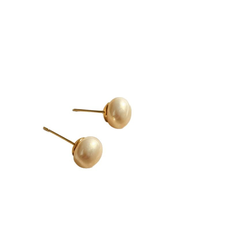 Women's Retro Elegant Champagne Flat Round Steamed Bread Pearl High-grade Niche Stud Earrings