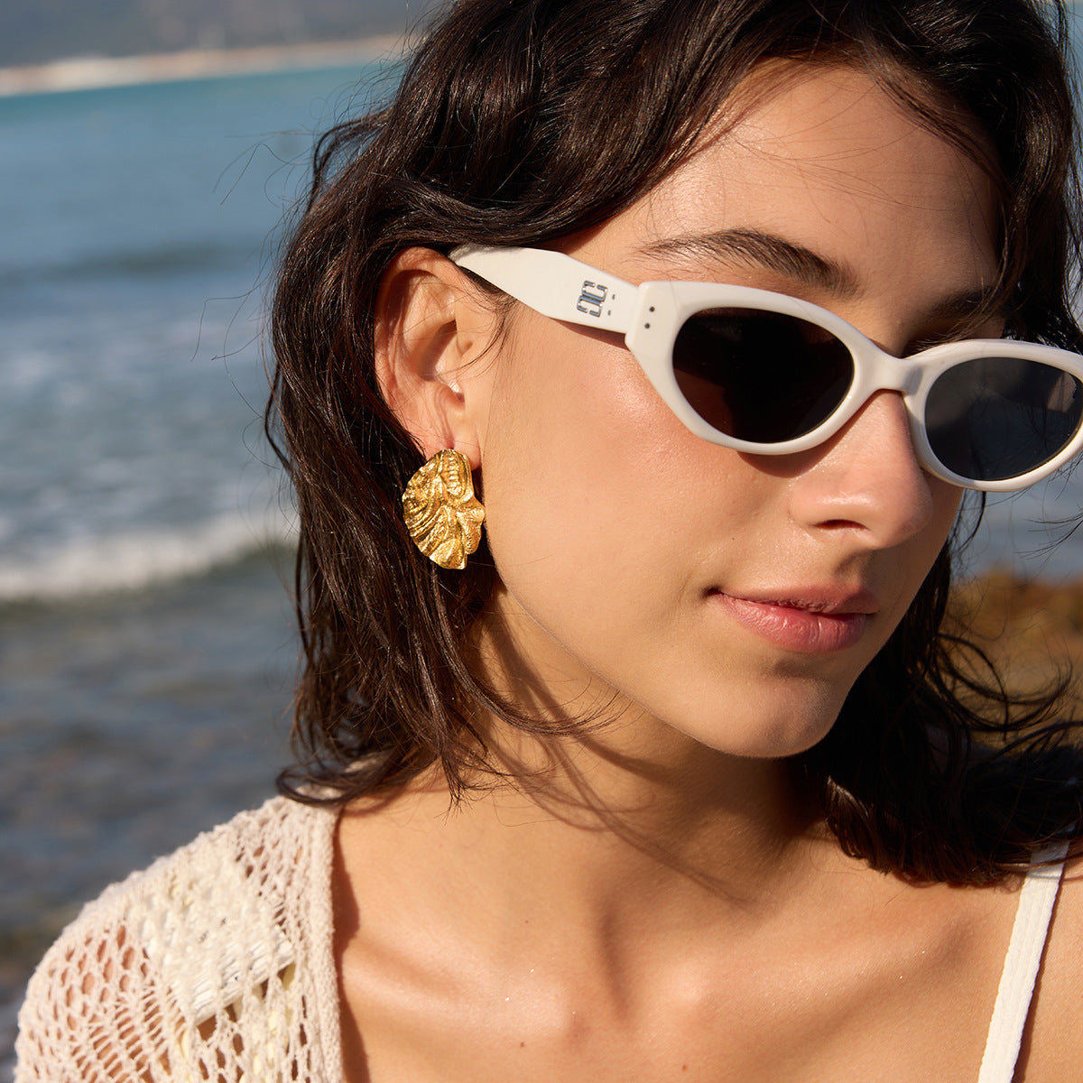 Women's Gravel Titanium Steel Ear Light Luxury High-grade Vacation Style Seaside Stud Earrings