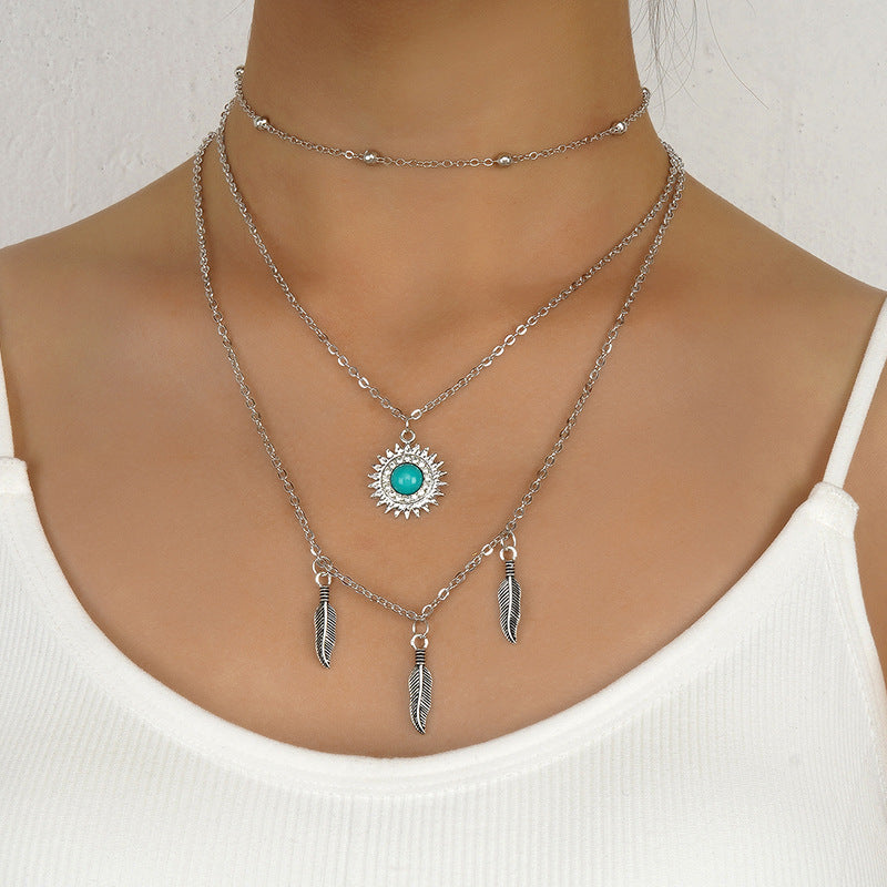 Retro Turquoise Spot Drill Alloy Feather Necklaces