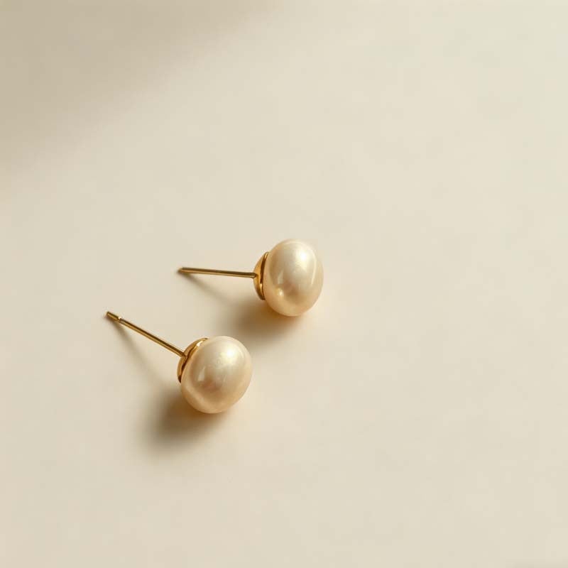 Women's Retro Elegant Champagne Flat Round Steamed Bread Pearl High-grade Niche Stud Earrings