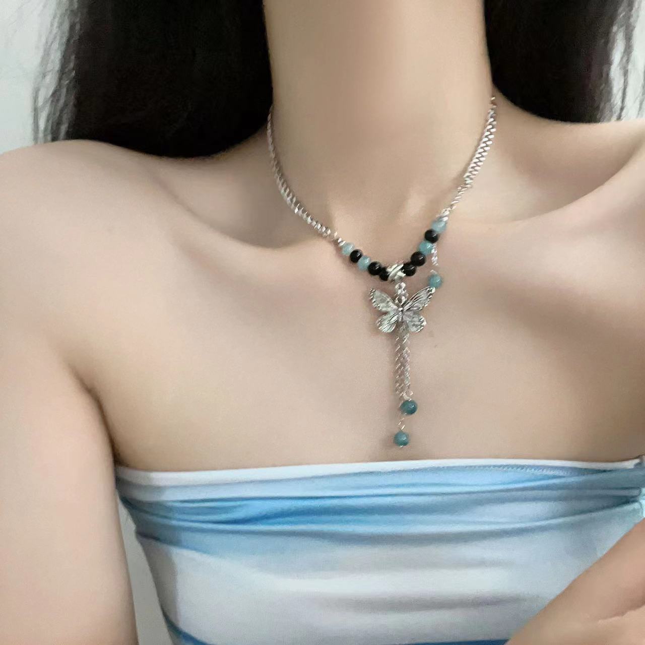 Women's Hollow Butterfly Ceramic Beaded Retro Ethnic Style Long Necklace