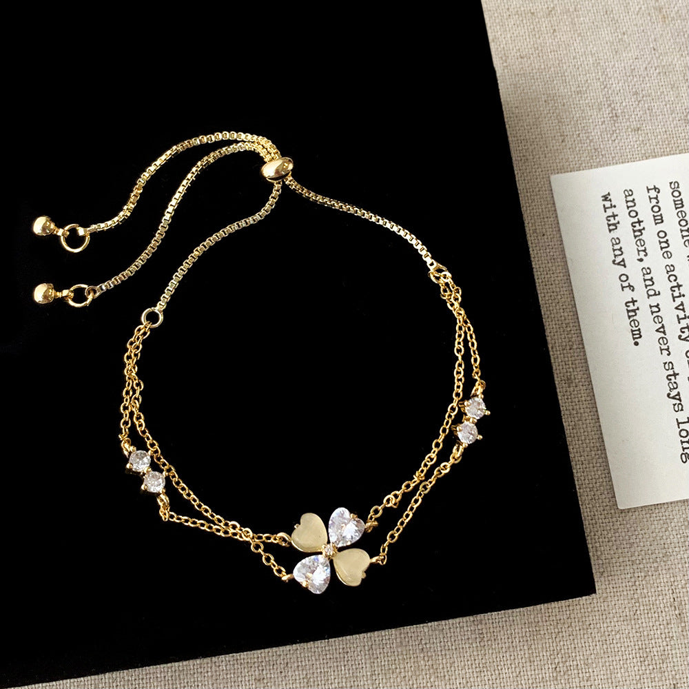 Women's Inlay Fritillary Four-leaf Flower Pull-out Light Luxury High-grade Bracelets
