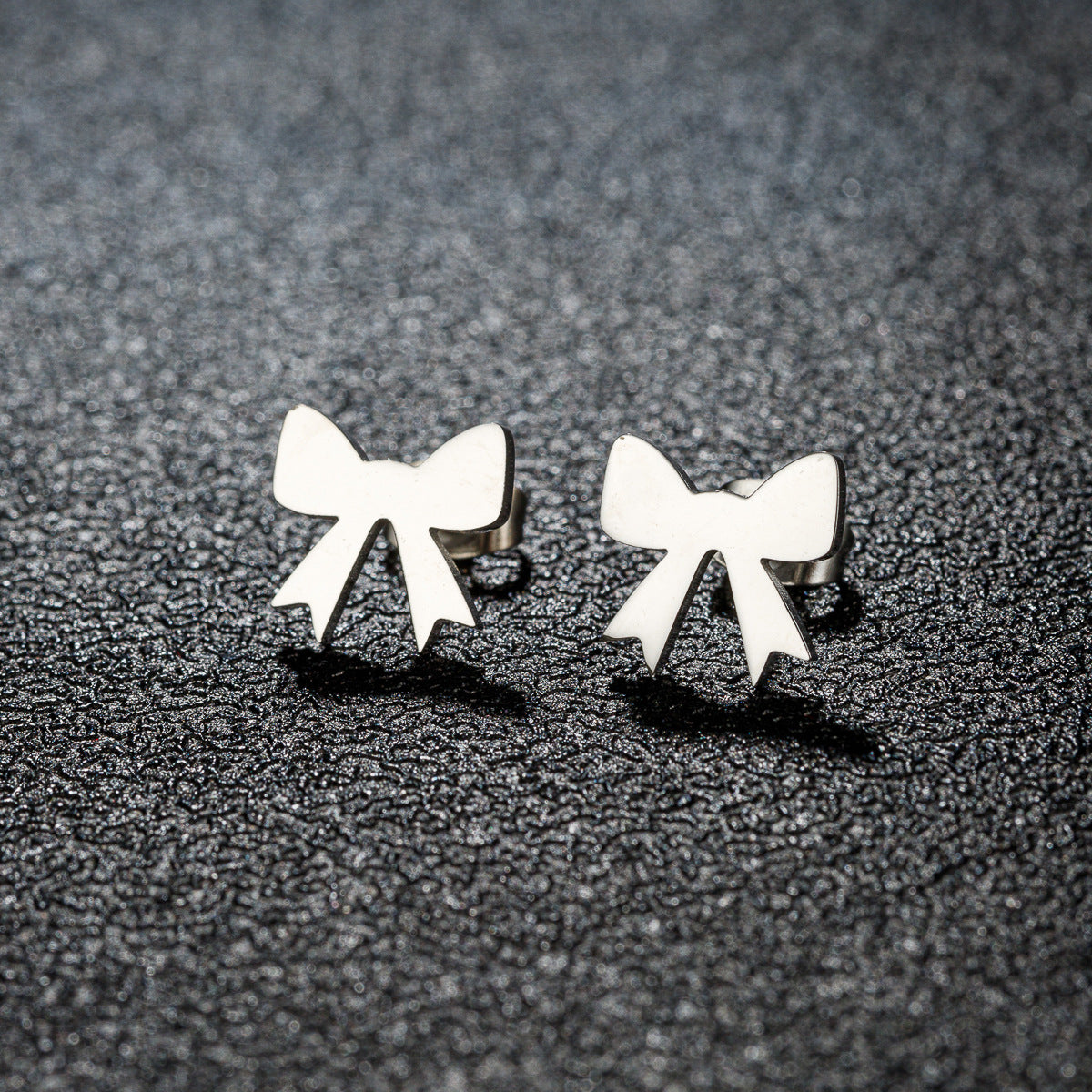 Women's Fashion Stainless Steel Personality Simple Style Bowknot Stud Earrings