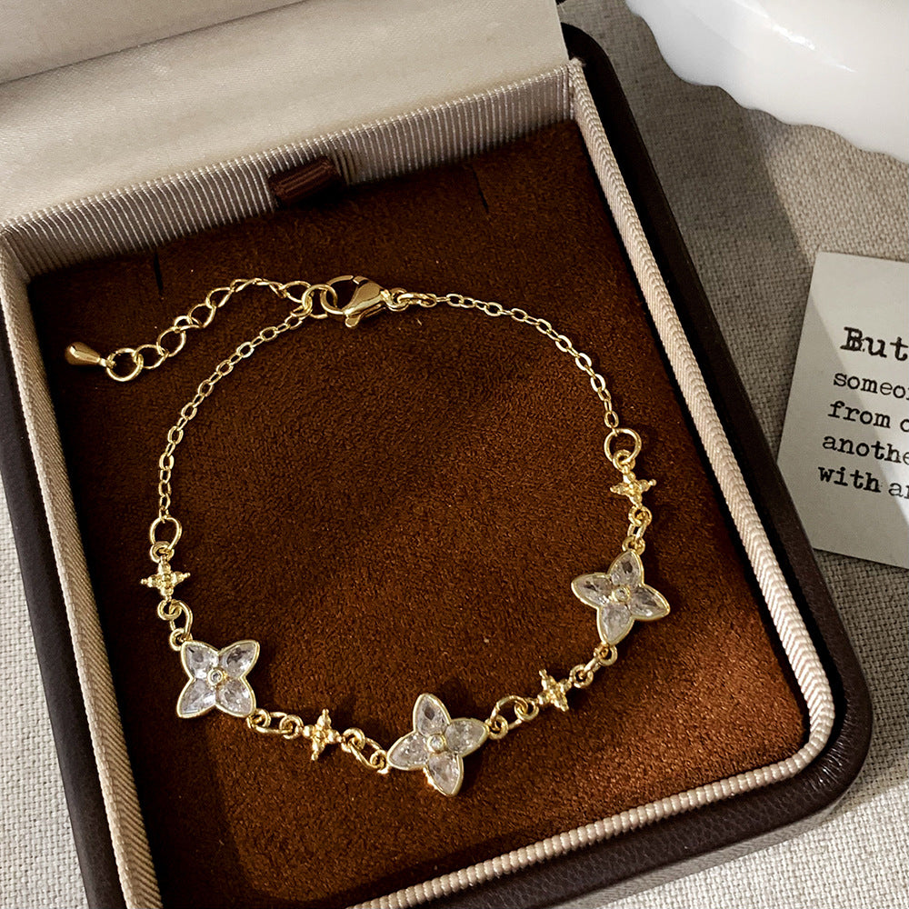 Women's Inlay Fritillary Four-leaf Flower Pull-out Light Luxury High-grade Bracelets