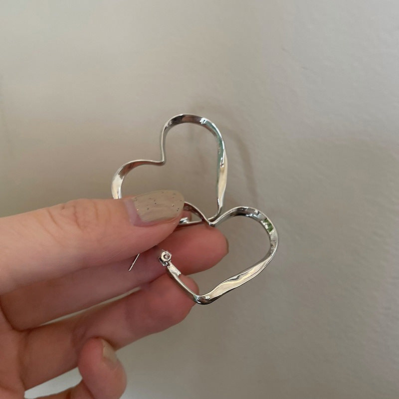 Women's Hollow Heart Ear Autumn Design Sweet Cool Hot Stud Earrings