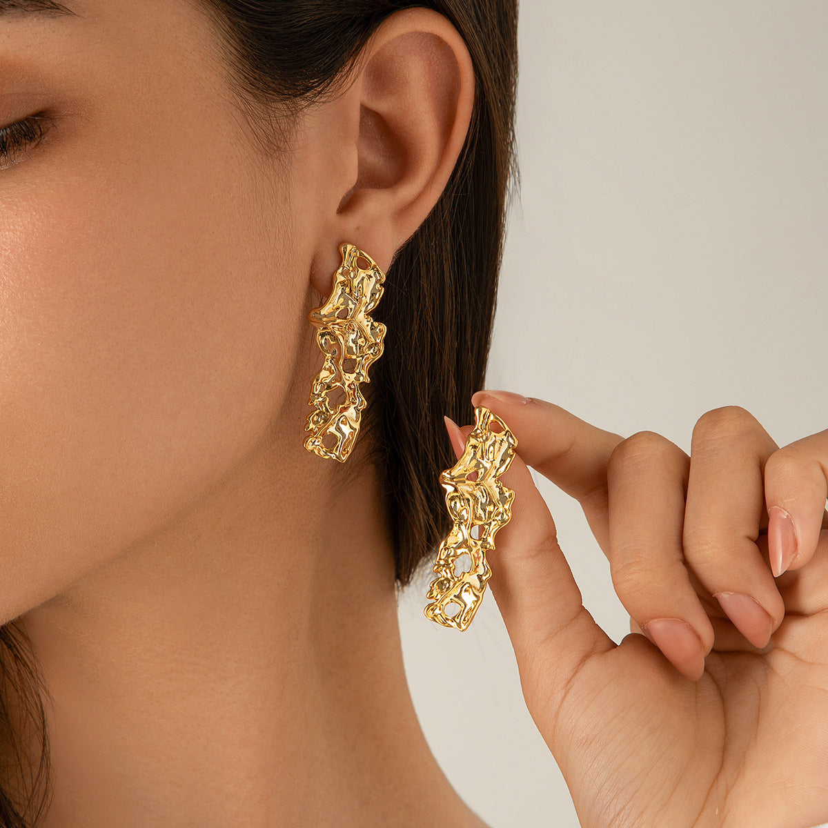 Women's Style Exaggerated Irregular Ear Punk Metal Fold Water Stud Earrings