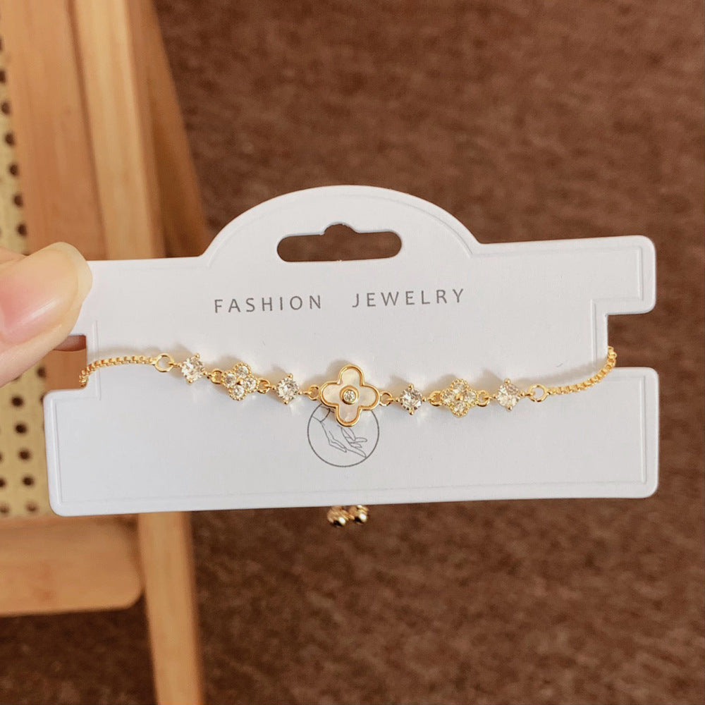 Women's Inlay Fritillary Four-leaf Flower Pull-out Light Luxury High-grade Bracelets