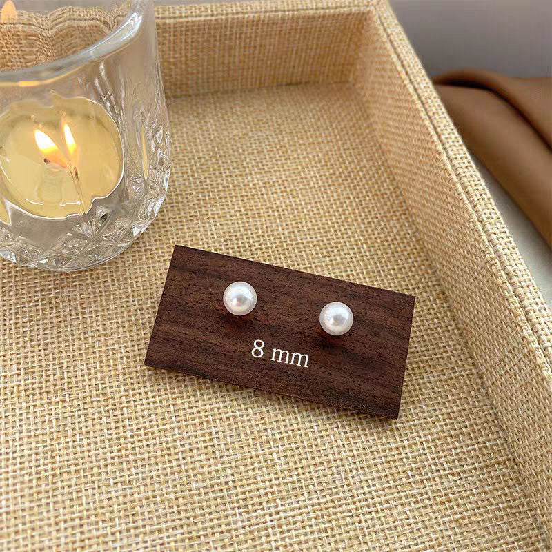 Women's Korean Style Metal Alloy Pearl High-grade Long Stall Light Stud Earrings