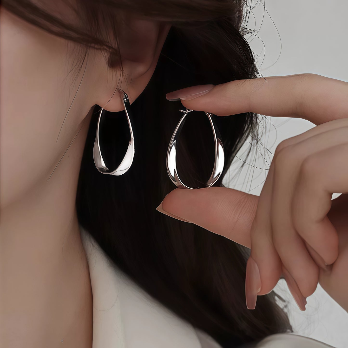 Sier Needle Mobius Female Niche Ear Rings