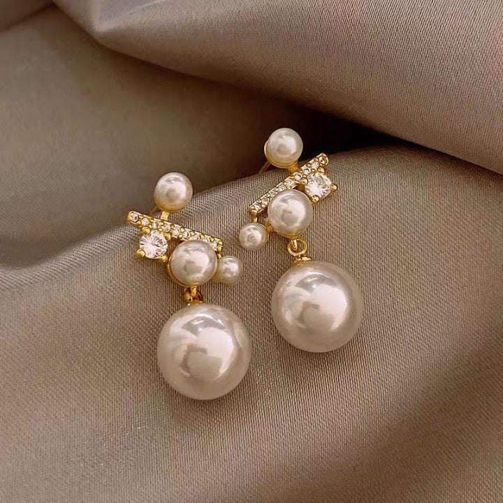 Charming Women's Bow Pearl Light Luxury Earrings