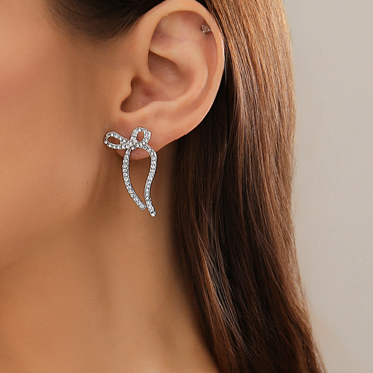 Women's Bow Metal Ribbon Knotted Snake Bones Earrings