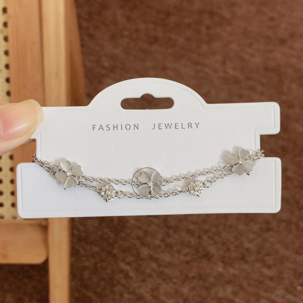 Women's Inlay Fritillary Four-leaf Flower Pull-out Light Luxury High-grade Bracelets