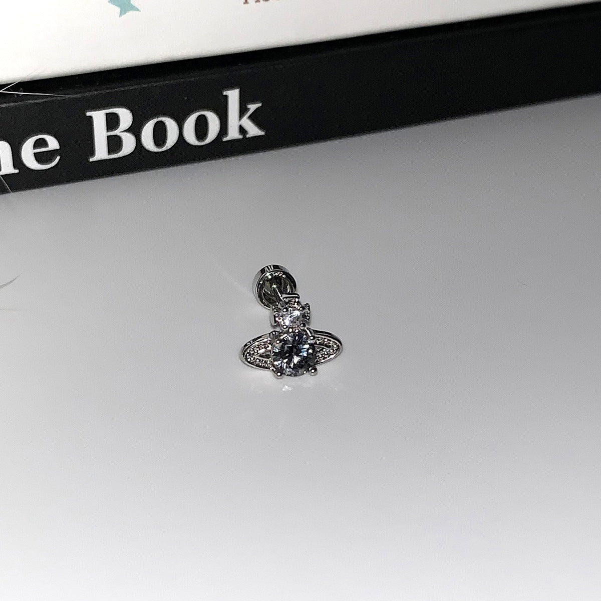 Ear Bone Female Titanium Steel Saturn Zircon Pin Dark Earrings