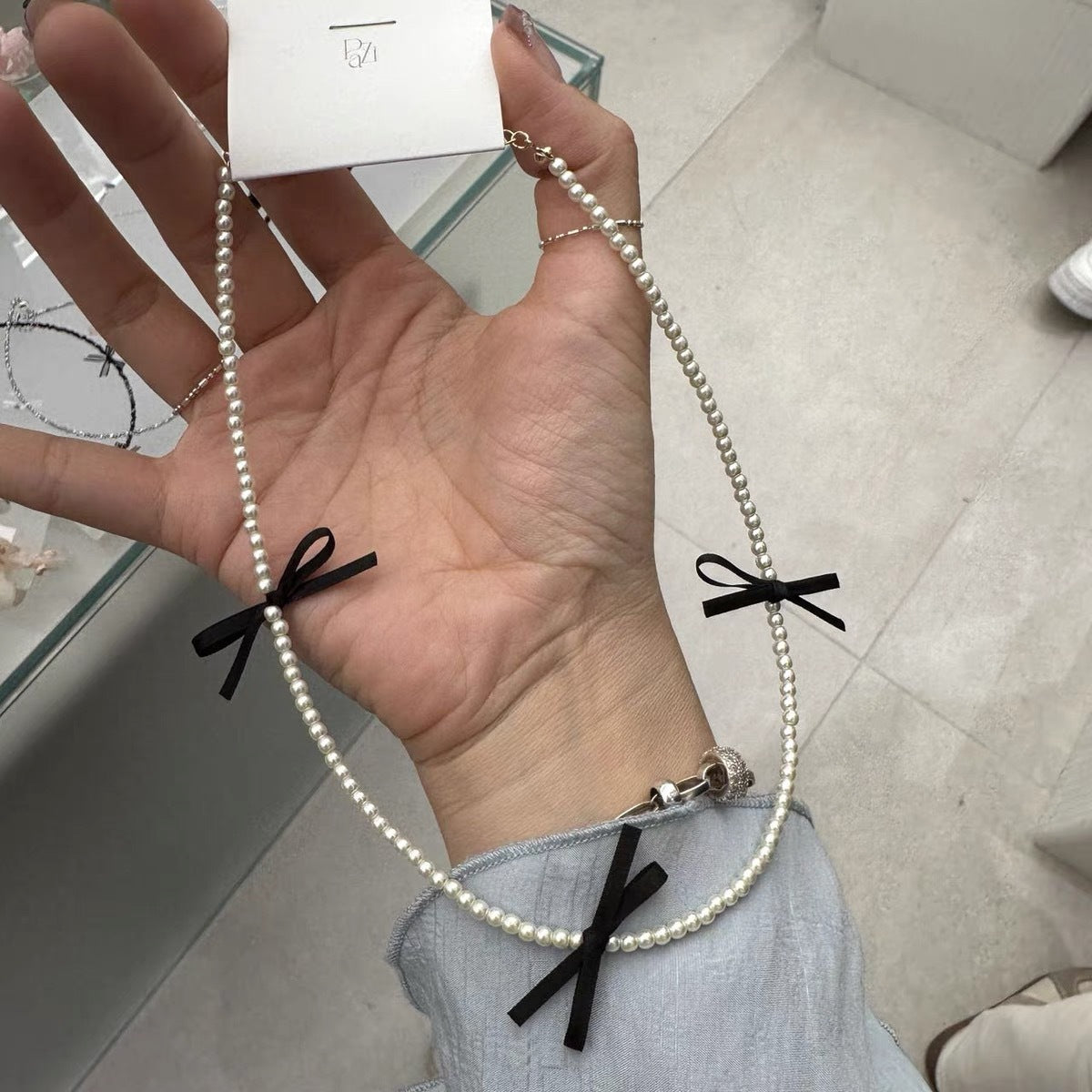 Bow String Pearl Female Temperament Titanium Necklaces