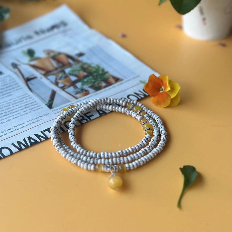 Bodhi Natural Mini Seed White Crafts Cat's Eye Bracelet