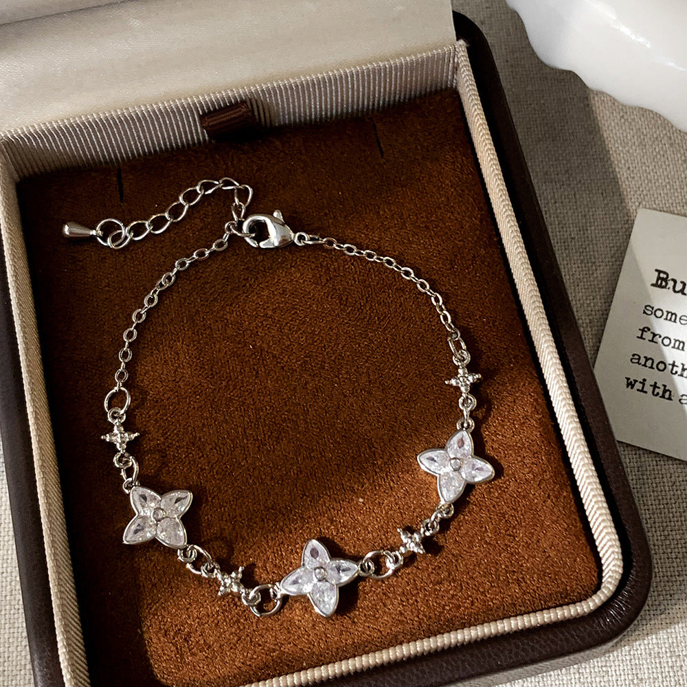 Women's Inlay Fritillary Four-leaf Flower Pull-out Light Luxury High-grade Bracelets