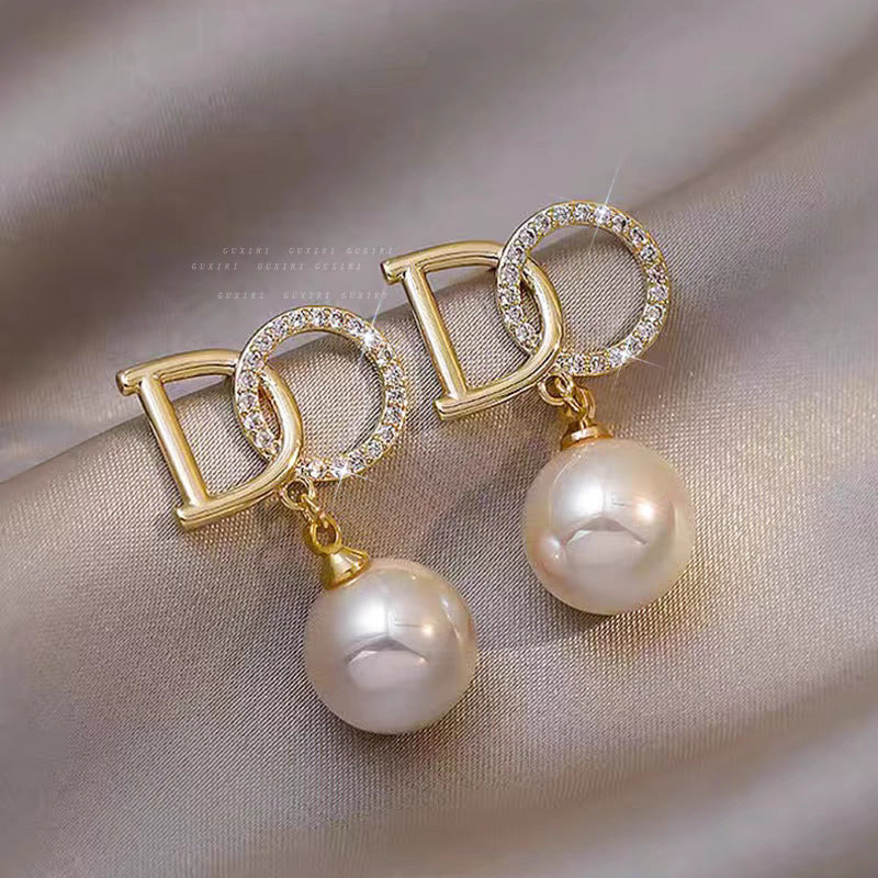 Charming Women's Bow Pearl Light Luxury Earrings