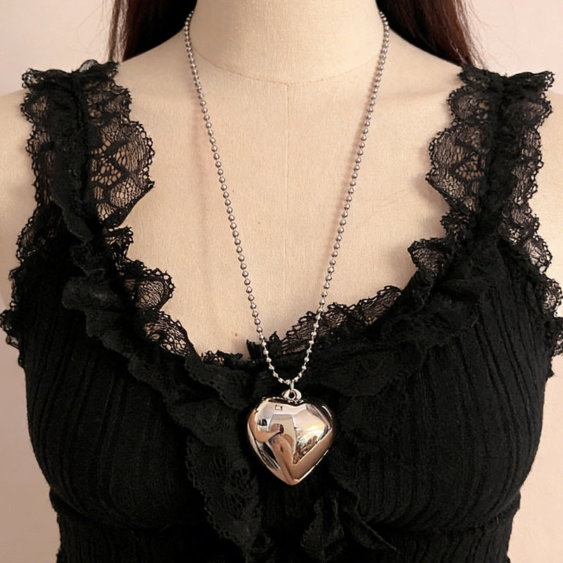 Women's Simple Sier Bow Metal Sweet High-grade Personality Sweater Pendants