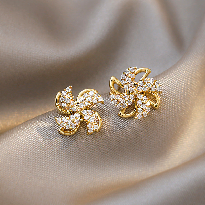 Rotatable Windmill Temperament Female Ear Sier Needle Earrings