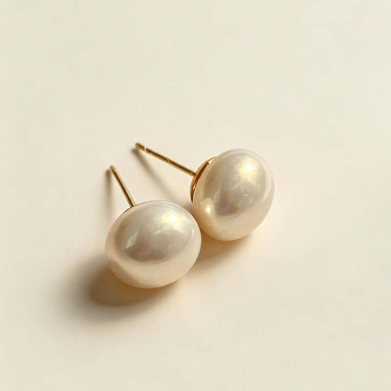 Women's Retro Elegant Champagne Flat Round Steamed Bread Pearl High-grade Niche Stud Earrings