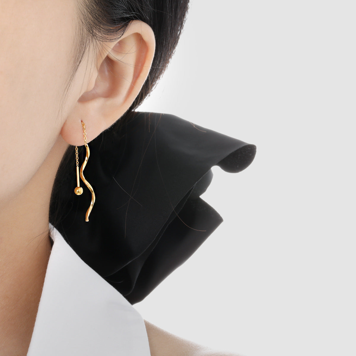 Simple Long Wave Twisted Fashion Unique Gold-plated Titanium Earrings