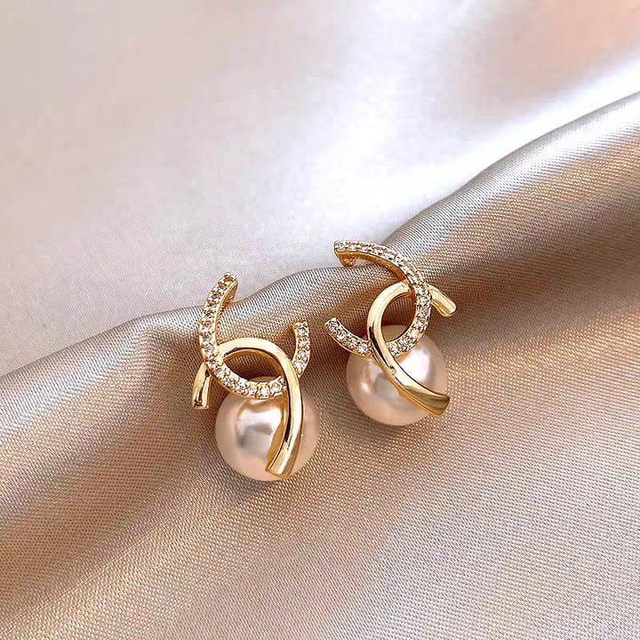 Charming Women's Bow Pearl Light Luxury Earrings