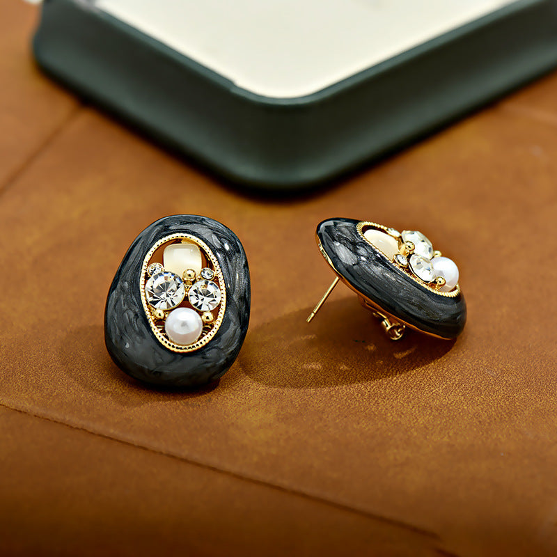 Women's Pearl Delicate Oval Fashion Design High-grade Light Stud Earrings