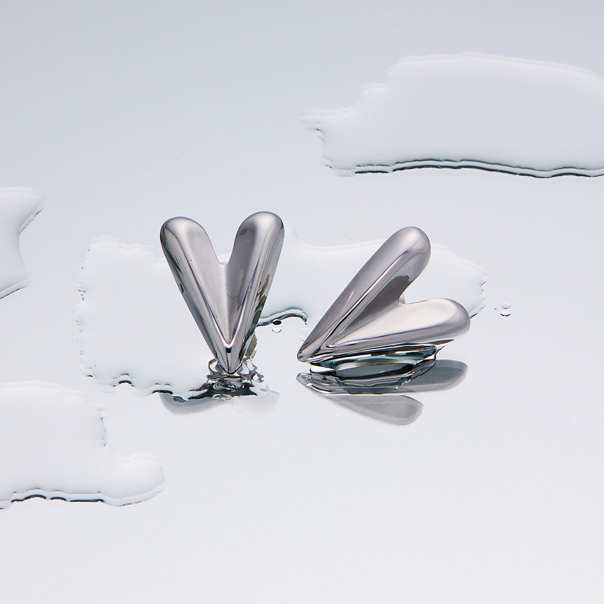 Women's Fashion Exaggerated Titanium Steel Ear High Sense Design Electroplating Stud Earrings