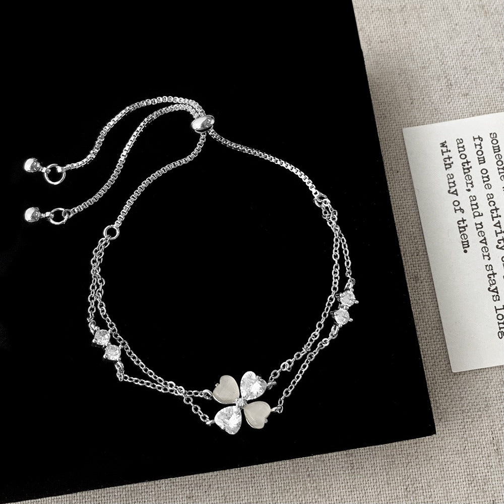 Women's Inlay Fritillary Four-leaf Flower Pull-out Light Luxury High-grade Bracelets