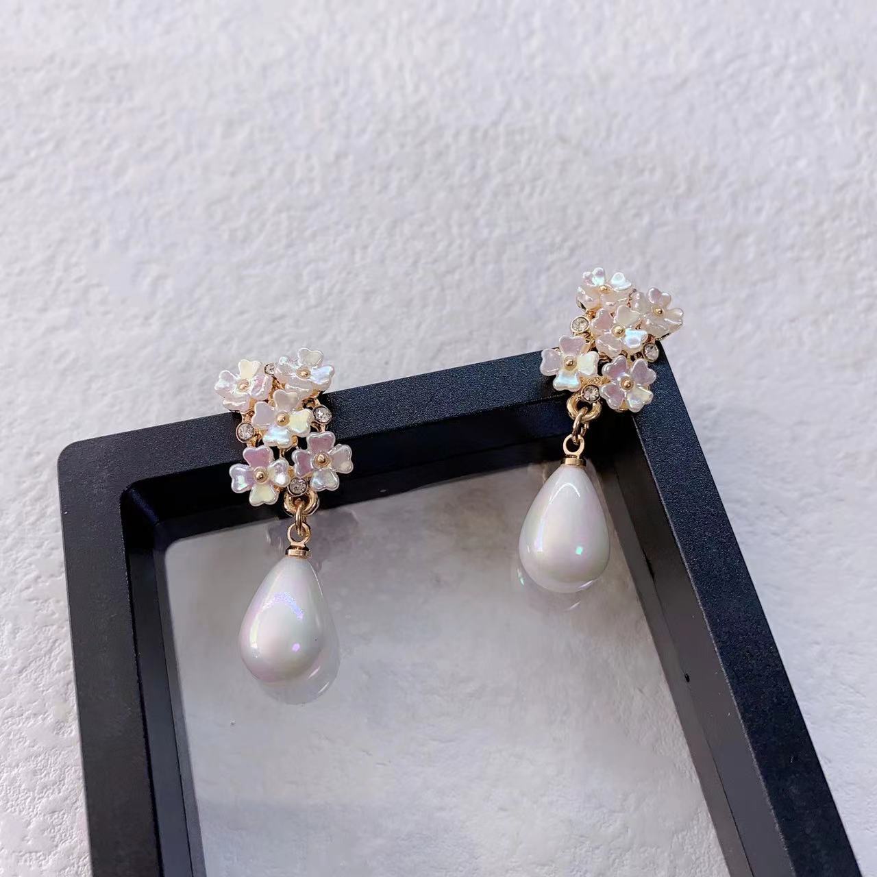 Sier Needle Imitation Shell Flower Design Creative Water Drop Rings