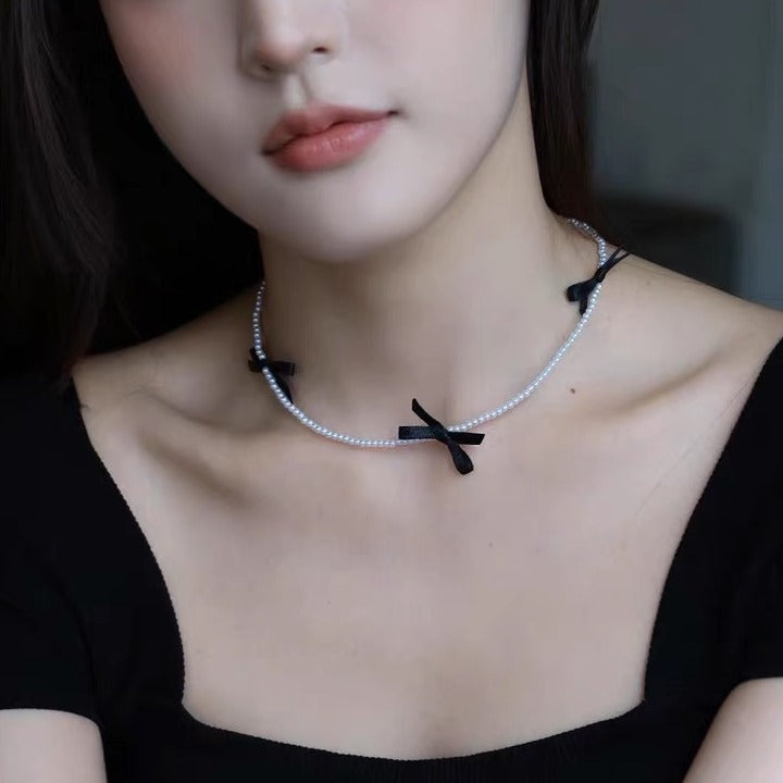 Bow String Pearl Female Temperament Titanium Necklaces